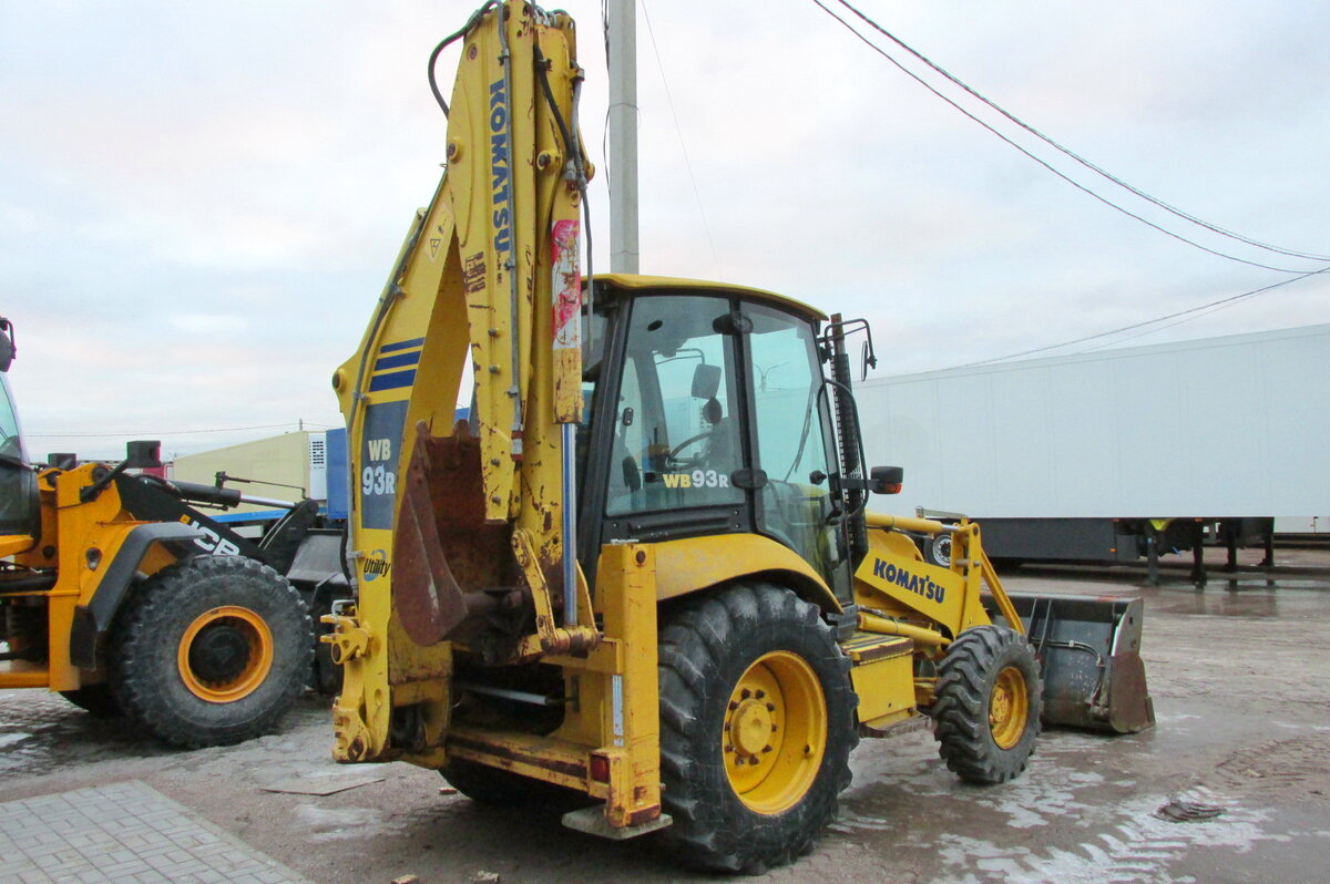 Backhoe loaders wb93r-5
 12pages